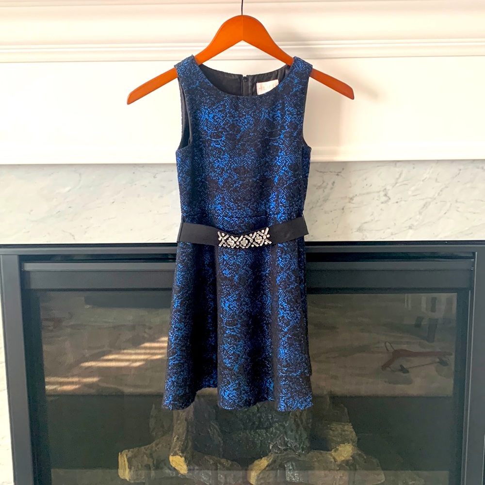 Black dress with shiny blue details from Place.